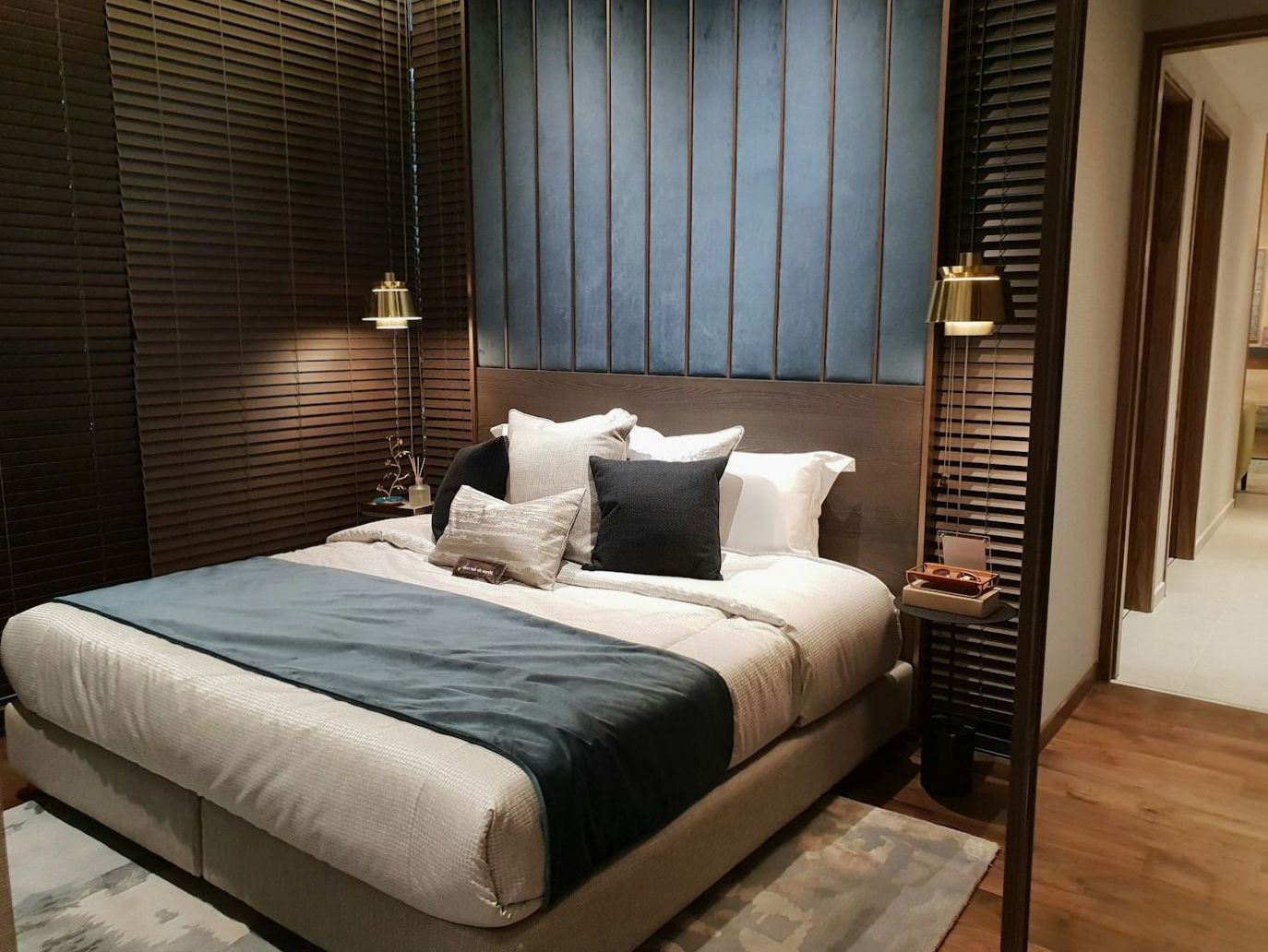 Family hotel room arranged with extra sleeping space and soft daylight