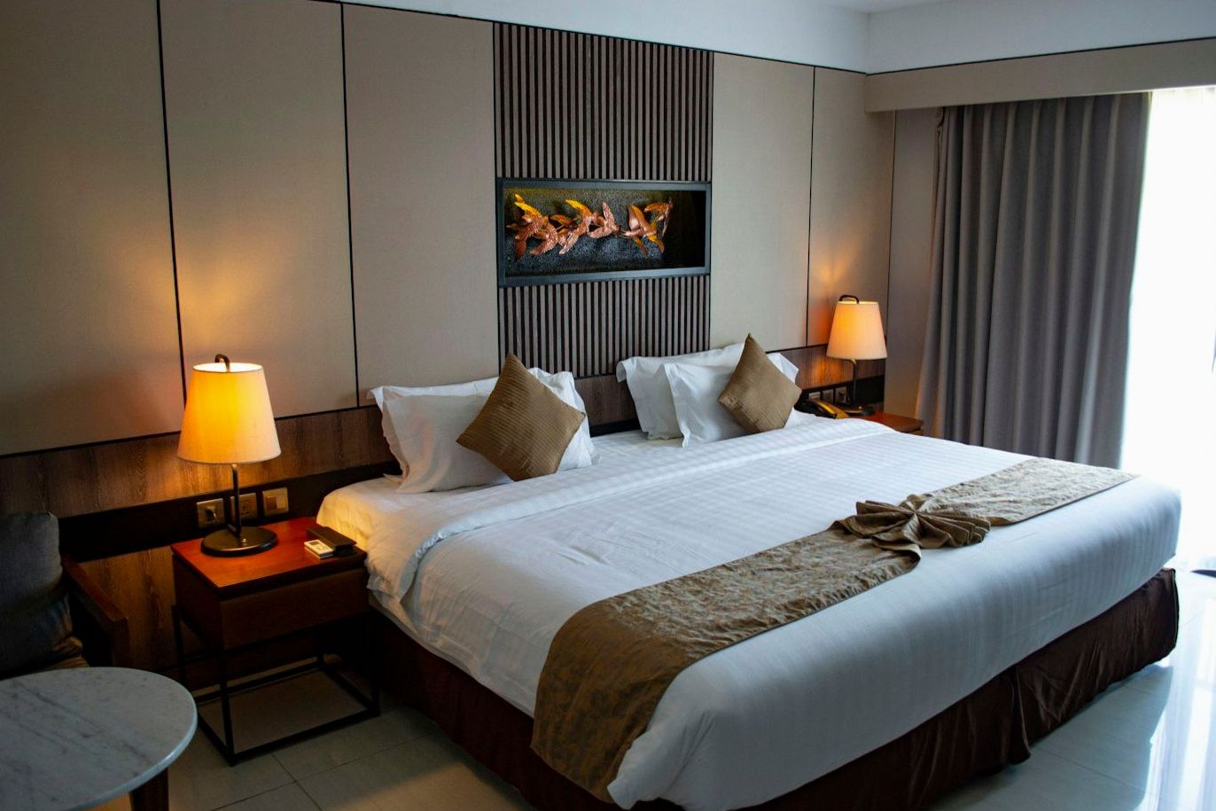 Executive hotel room with writing desk and contemporary Australian interior